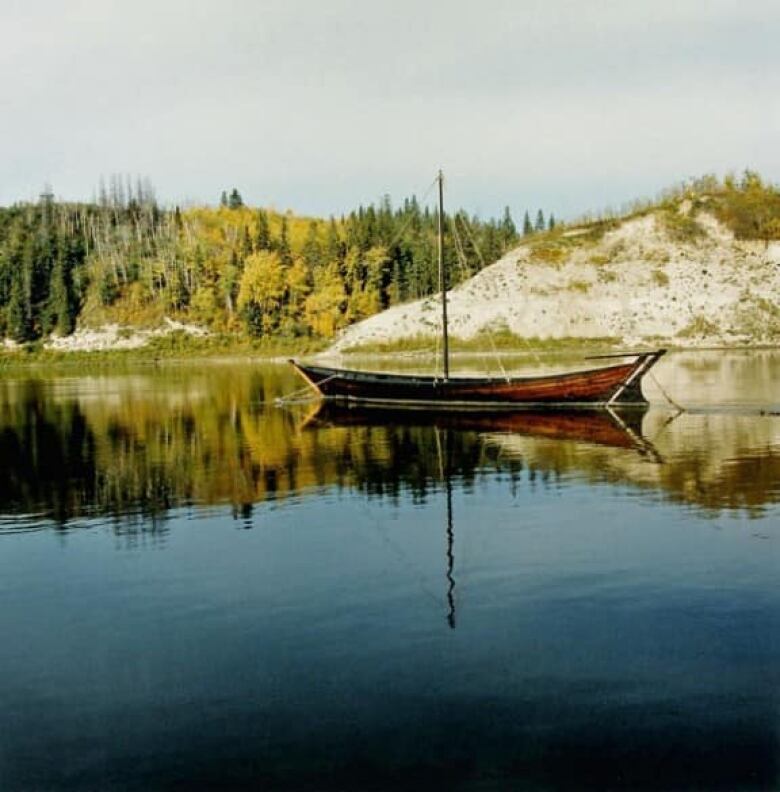 A photo of a York boat replica on the North Saskatchewan River.