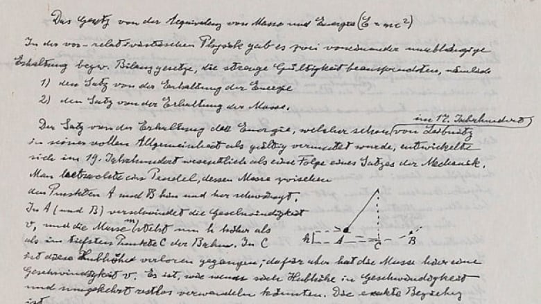 Handwritten notes that contain Einstein's formula