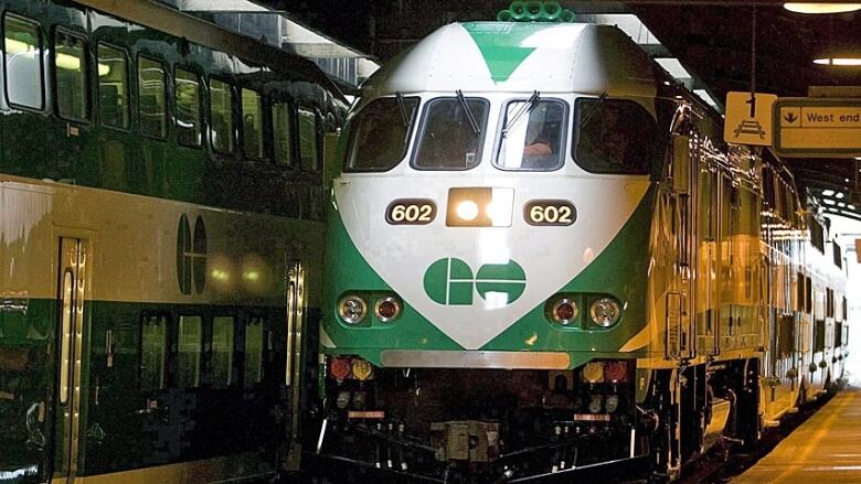 A GO Train arriving at a station in Toronto.