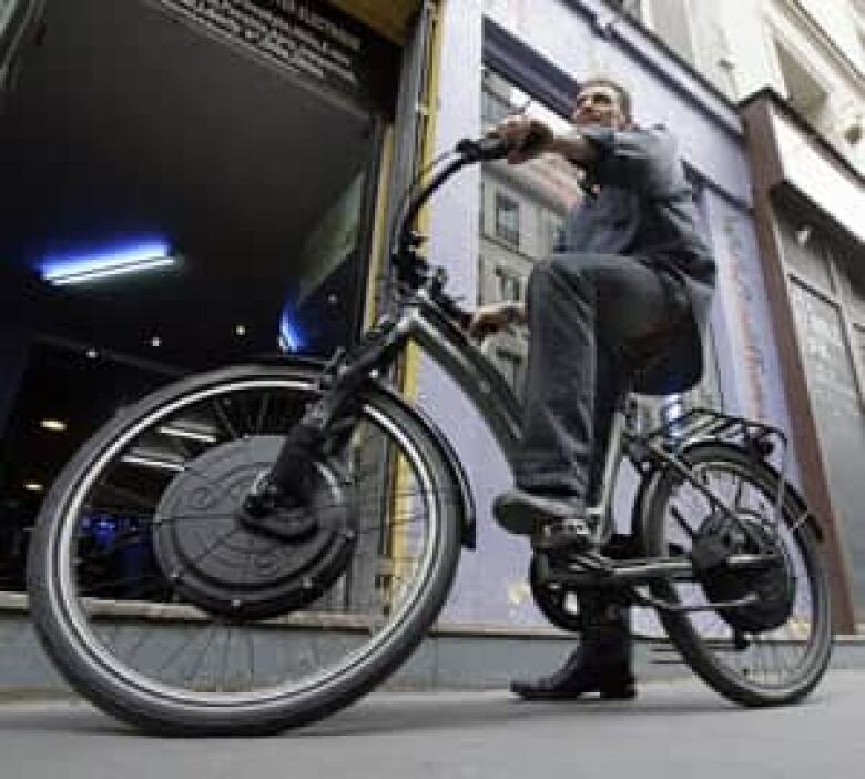 A electric bike is seen being ridden in a file photo.