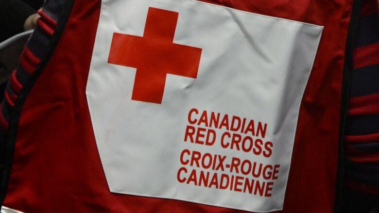 A Canadian Red Cross vest seen from behind.