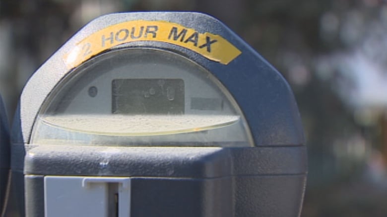 A close-up of a parking meter.