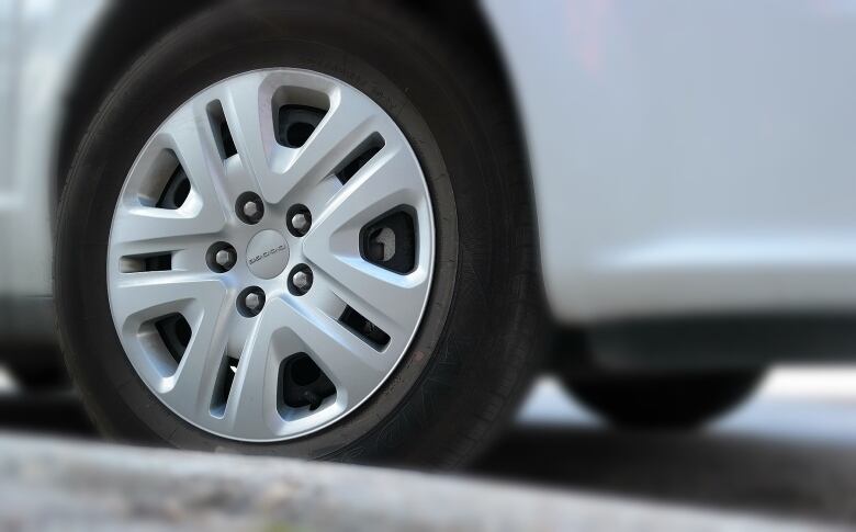 A car tire is pictured.