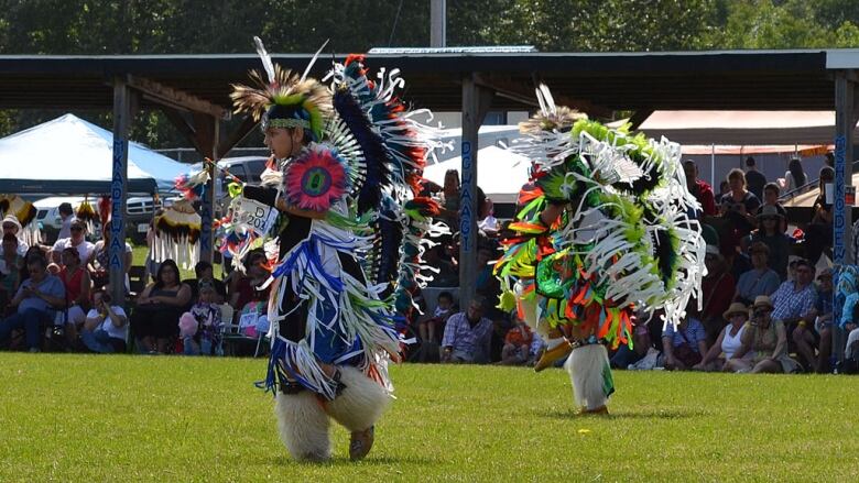 Traditional Indigenous dancers at a 2014 powwow on Manitoulin Island in Ontario. 