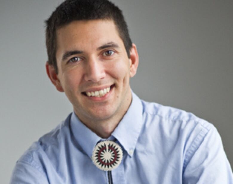 A headshot of lawyer Kris Statnyk.