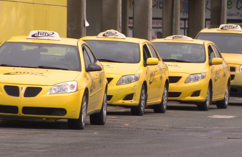 A line of yellow taxis