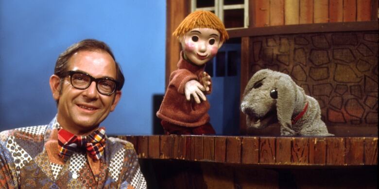 Puppets Casey and Finnegan with Ernie Coombs, who portrayed Mr. Dressup on the iconic children's show.