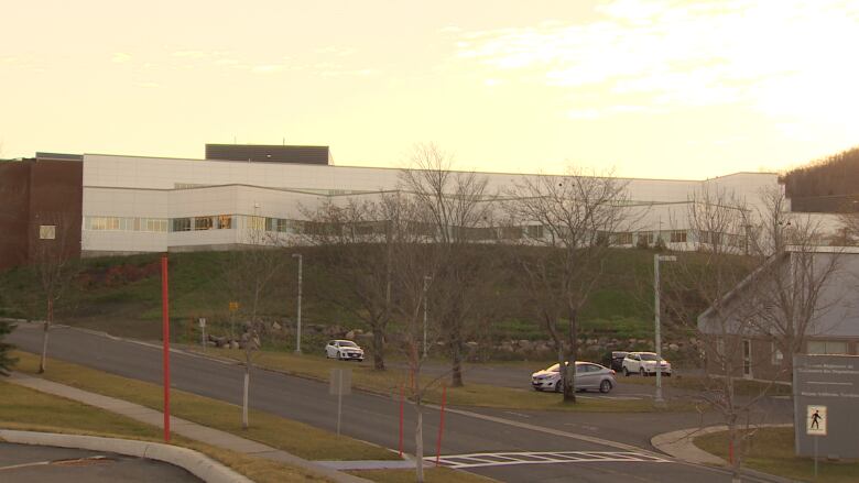 A large white and brown building.