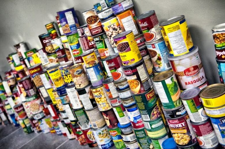 Cans of food on a shelf