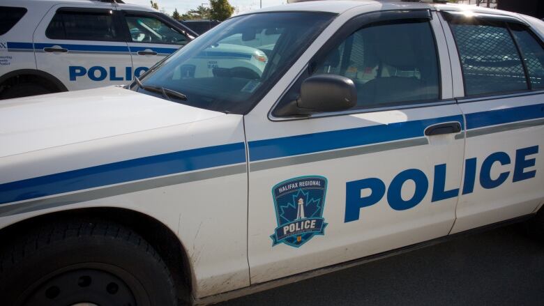 A halifax regional police cruiser parked outside.