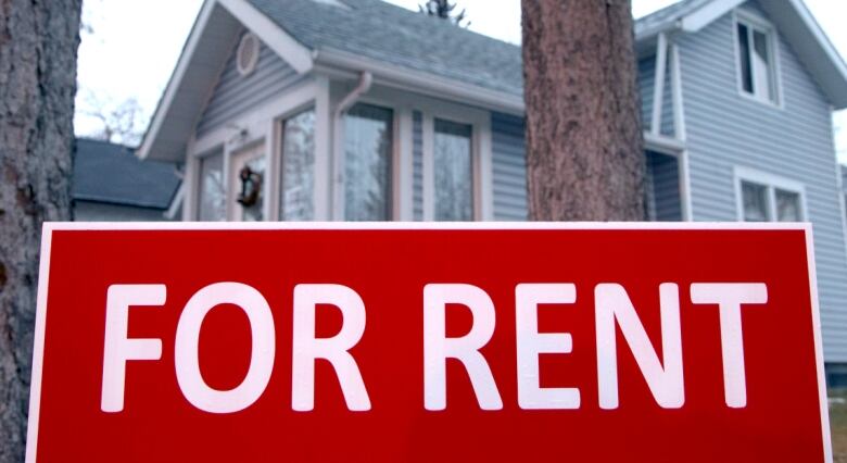 A sign advertises available rental accommodations at a house in Calgary.