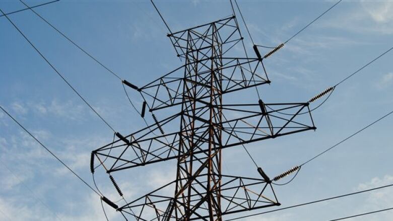 Hydro tower against blue sky