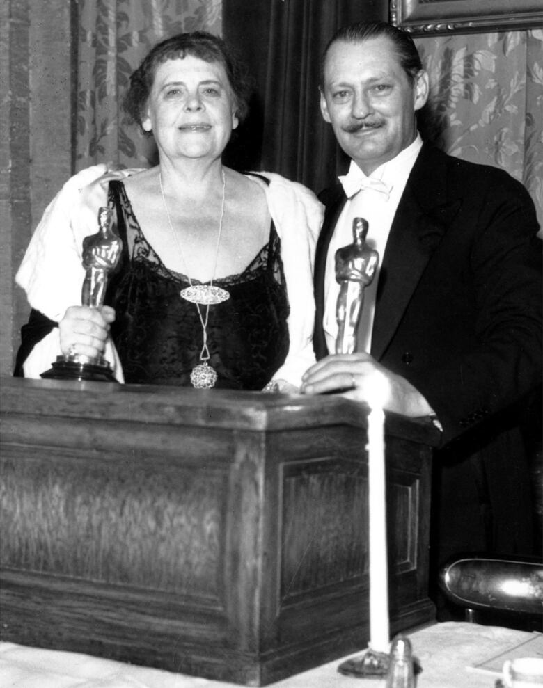   Marie Dressler and Lionel Barrymore pose with their Oscar statuettes at the Academy of Motion Picture Arts and Sciences Awards in Los Angeles, Ca. on Nov. 13, 1931. They won for best screen performances of the year for their work in 