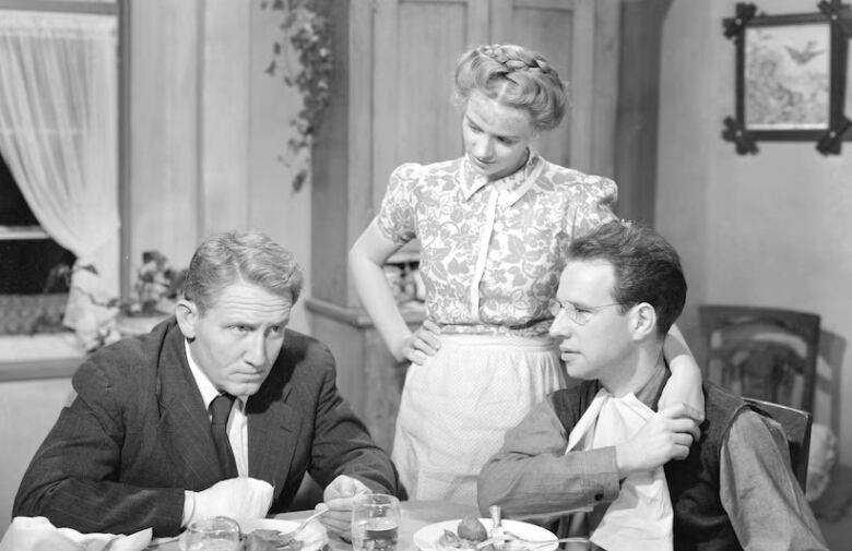 Actors Spencer Tracy, Jessica Tandy, and Hume Cronyn in a scene from  the 1944 film The Seventh Cross.