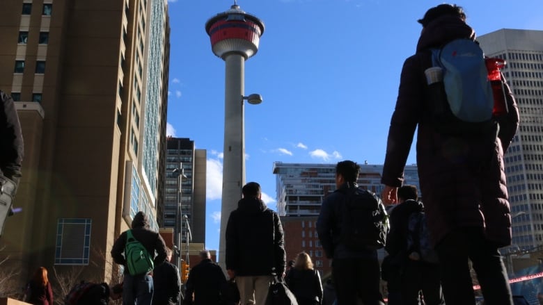 People walk through downtown Calgary in this file photo.