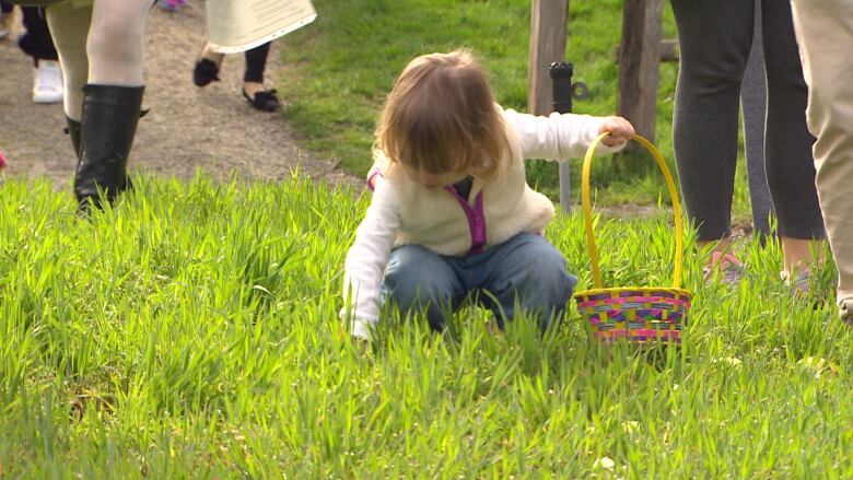 A young egg hunter is focused on the task at hand.