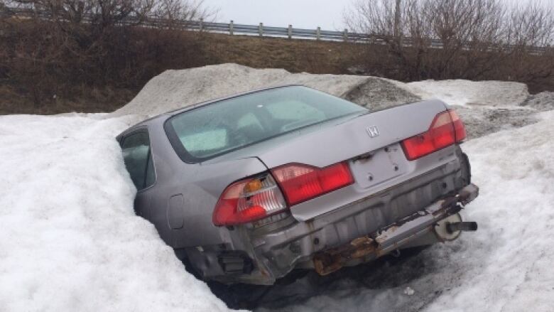 a car hidden in the snow 