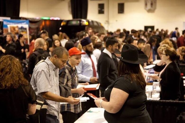 Crowds of people at hiring fair