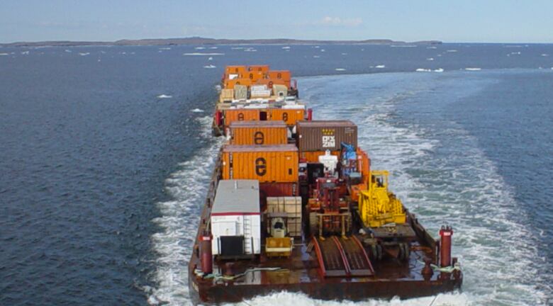 Barge on water.