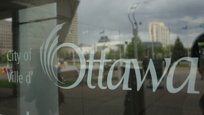 A window with the city of ottawa logo on it.