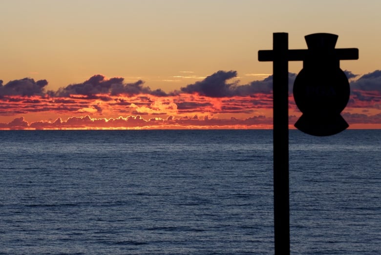 The sun rises over Lake Michigan last year. The small city of Waukesha, Wisc., has won approval to pull its drinking water from Lake Michigan, despite not being part of the Great Lakes watershed.