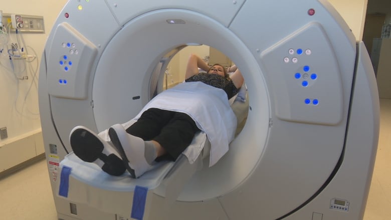 A woman inside the CT scanner at Prince County Hospital in Summerside.