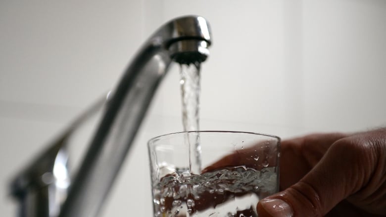 Water running from a tap.