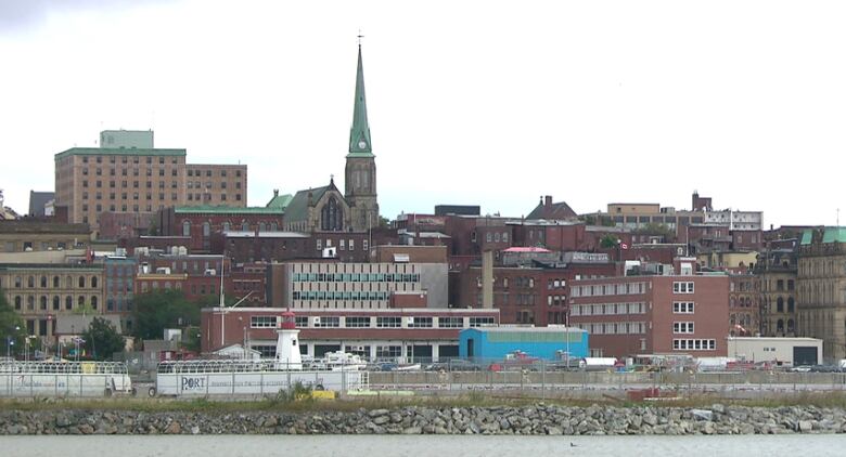 A skyline with a tall church steeple.