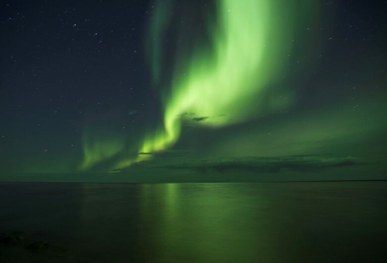 The aurora borealis appears over Great Bear Lake.