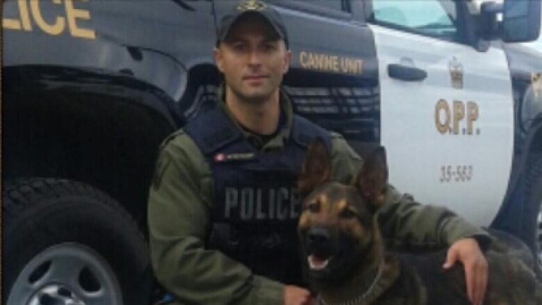 Essex County OPP Constable Milan Matovski with two-year-old K9 Maximus.