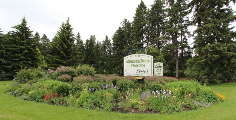 A carefully manicured garden with a sign that reads Reader Rock Garden.