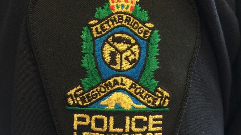 Image a of police crest that reads Lethbridge Regional Police.