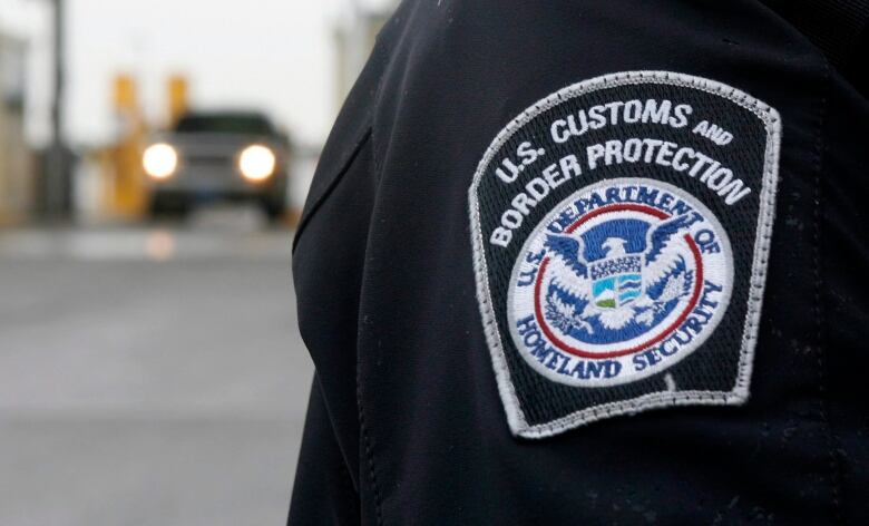 U.S. Customs and Border Protection (CMP) officer patch close up.