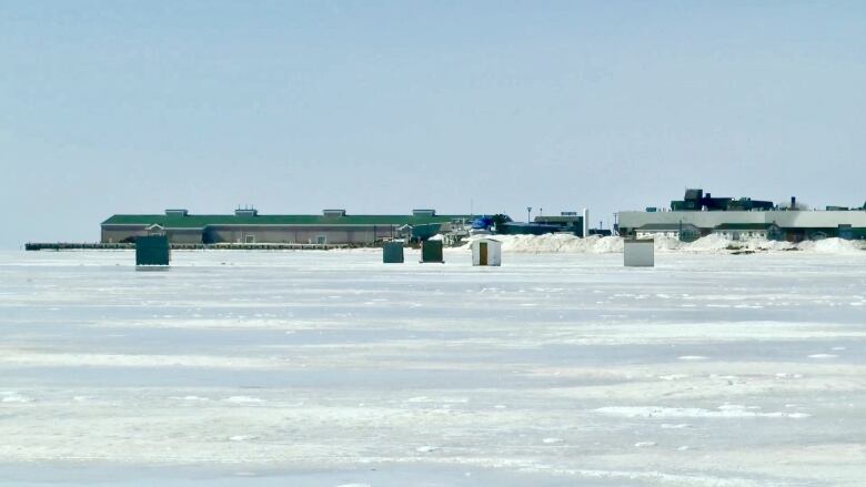 Wooden smelt shacks on the ice in Summerside harbour in 2017