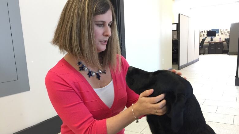 Shelley Adams with her guide dog, Pogo.