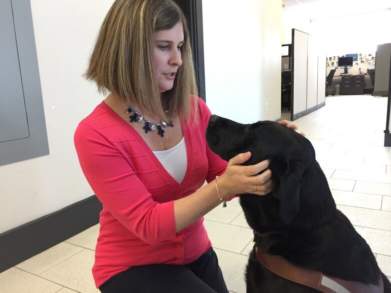 Shelley Adams with her guide dog, Pogo.