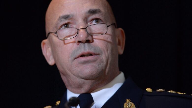 RCMP commissioner Bob Paulson speaks during a new conference in in Ottawa on Thursday, Oct. 6, 2016. Paulson has apologized to hundreds of current and former female officers and employees for alleged incidents of bullying, discrimination and harassment.