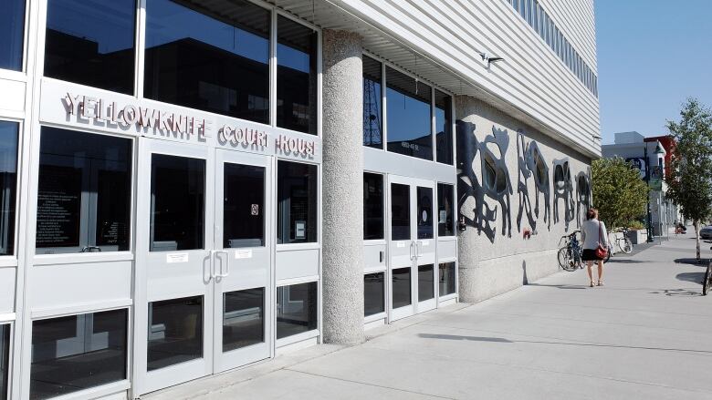 Image of a building with a sign that says 'Yellowknife Courthouse' 