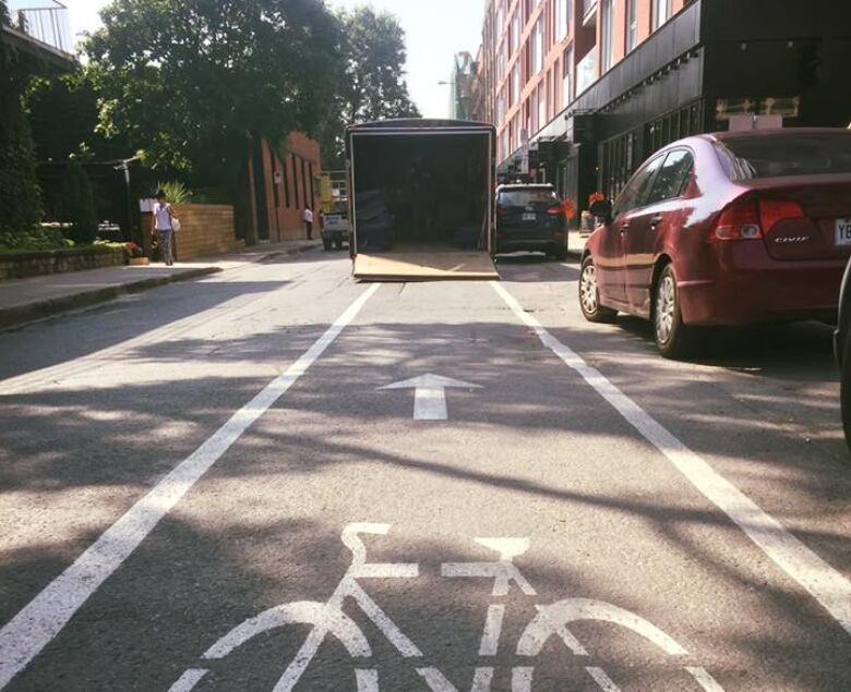 Members of #dansmapiste post photos of cars, trucks and even steam rollers blocking bike paths. 