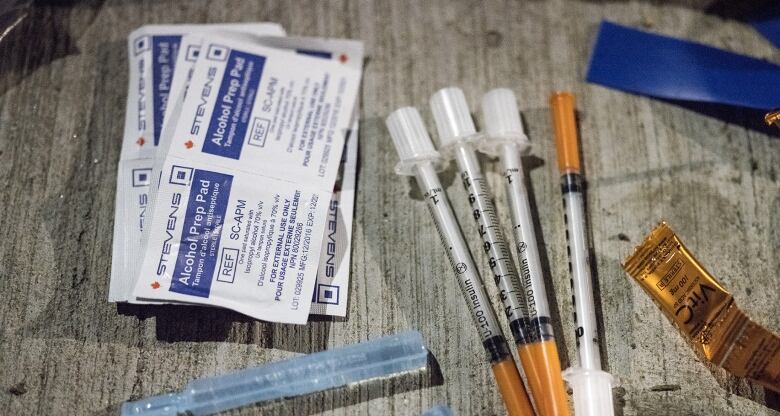 The safe injection kits given out to drug users in Toronto contain things like syringes,  metal cookers and alcohol swabs. The kits are put together by volunteers and made available to whomever stops by the tents at Moss Park.