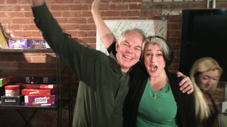 P.E.I. Green Leader Peter Bevan-Baker celebrates with Hannah Bell on the night of her byelection victory.