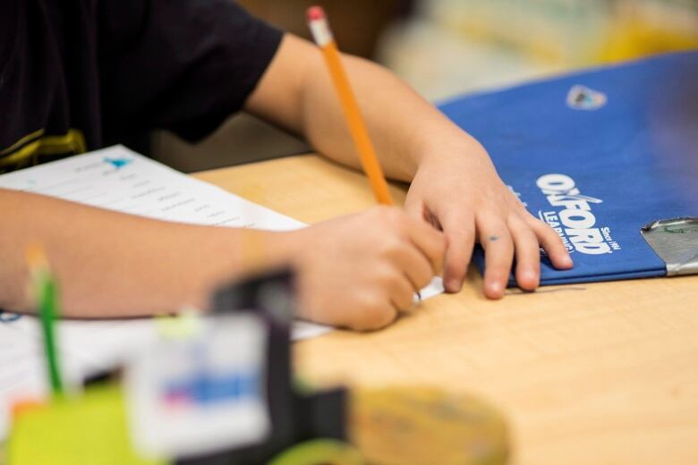 A student works at an Oxford Learning program in Toronto on Thursday, Dec. 7, 2017