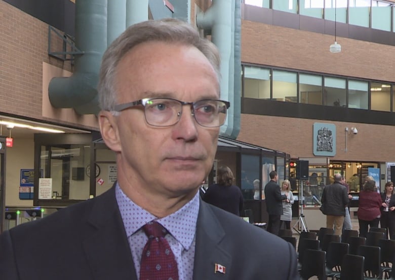 Sean Casey in suit and tie at Veterans Affairs office in Charlottetown.