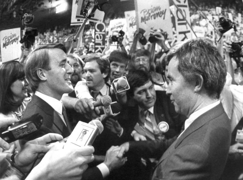  Brian Mulroney and Joe Clark meet on the floor of the Conservative leadership convention in Ottawa, June 11, 1983. The Conservative partys past flashed before its eyes Wednesday, in the form of renewed claims that foreign money was raised by backers of Mulroney to help undermine  Clarks leadership in 1983.