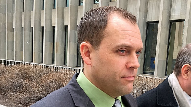 Man walks outside of court house