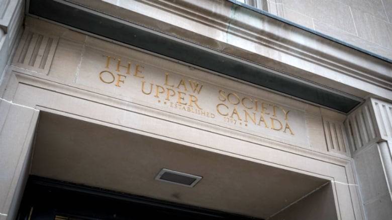 The entrance of a building with the words 'the Law Society of Upper Canada' above it.