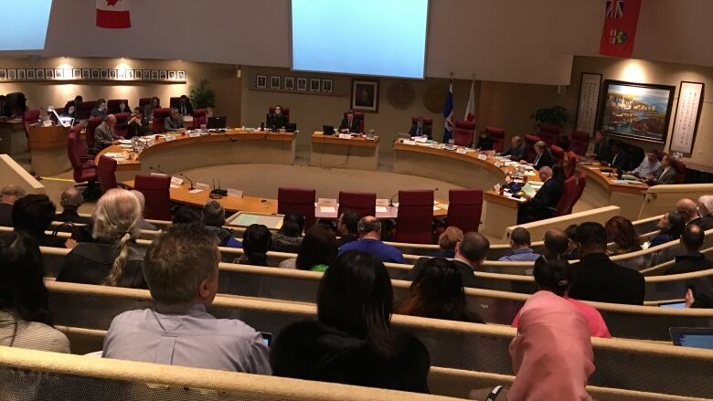 Mayor John Tory's executive committee debated the city's new long-term financial plan at the Scarborough Civic Centre on Monday. But some councillors want that conversation to happen at city hall, too.