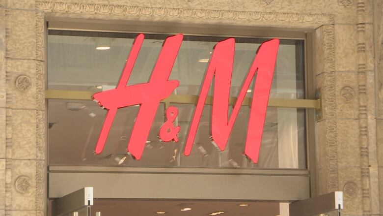 Red letters of H&M on the side of a building