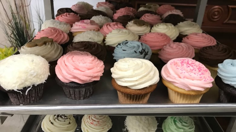 Trays of cupcakes.