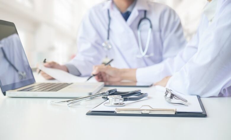 Stethoscope with clipboard and Laptop on desk,Doctor working in hospital writing a prescription, Healthcare and medical concept,test results in background,vintage color,selective focus.; Shutterstock ID 603688487; Cost Ctr: redownload; Manager: redownload; Email: redownload; Project: redownload